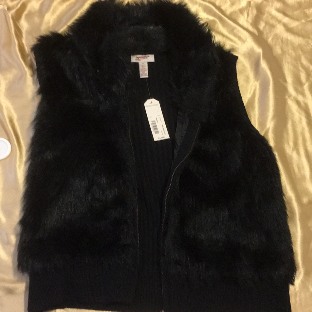Faux Fur Arizona Jean Co. zip up vest.